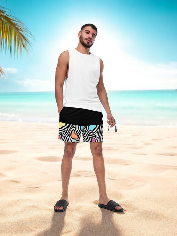 Aurora daze mens swimshorts swimtrunks for men oumaima swim recycled mens boardshorts abract colorful print digital print, seen on model at the beach
