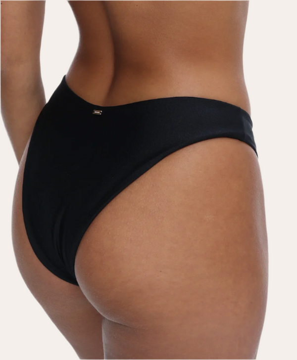 Amour black bikini Bottoms in Onyx with a gold ring, Sustainable recycled swimwear luxury bikini, seen on a model zoomed in with gold tag detail oumaima swim
