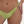 Amour recycled bikini Bottoms in Pistachio green sustainable swimwear luxury miami brand oumaima swim, seen on model close up with gold ring detail