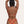 high rise bikini bottoms recycled full coverage bottoms bikini oumaima swim gold ring detail mexican print orange, seen on model from the back with her hands up 