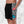 Aurora daze mens swimshorts swimtrunks for men oumaima swim recycled mens boardshorts abract colorful print digital print, seen with hands in pockets from the side 