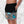 Aurora daze mens swimshorts swimtrunks for men oumaima swim recycled mens boardshorts abstract colorful print digital print , seen with hands in pockets