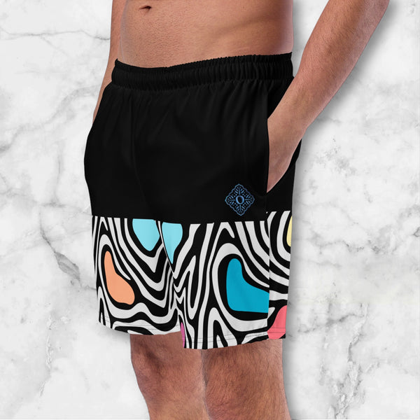 Aurora daze mens swimshorts swimtrunks for men oumaima swim recycled mens boardshorts abstract colorful print digital print , seen with hands in pockets